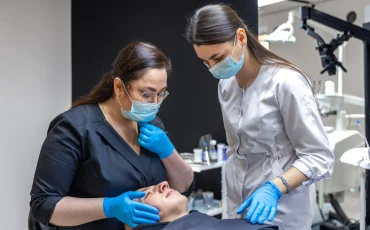 team female doctors treating patients skin